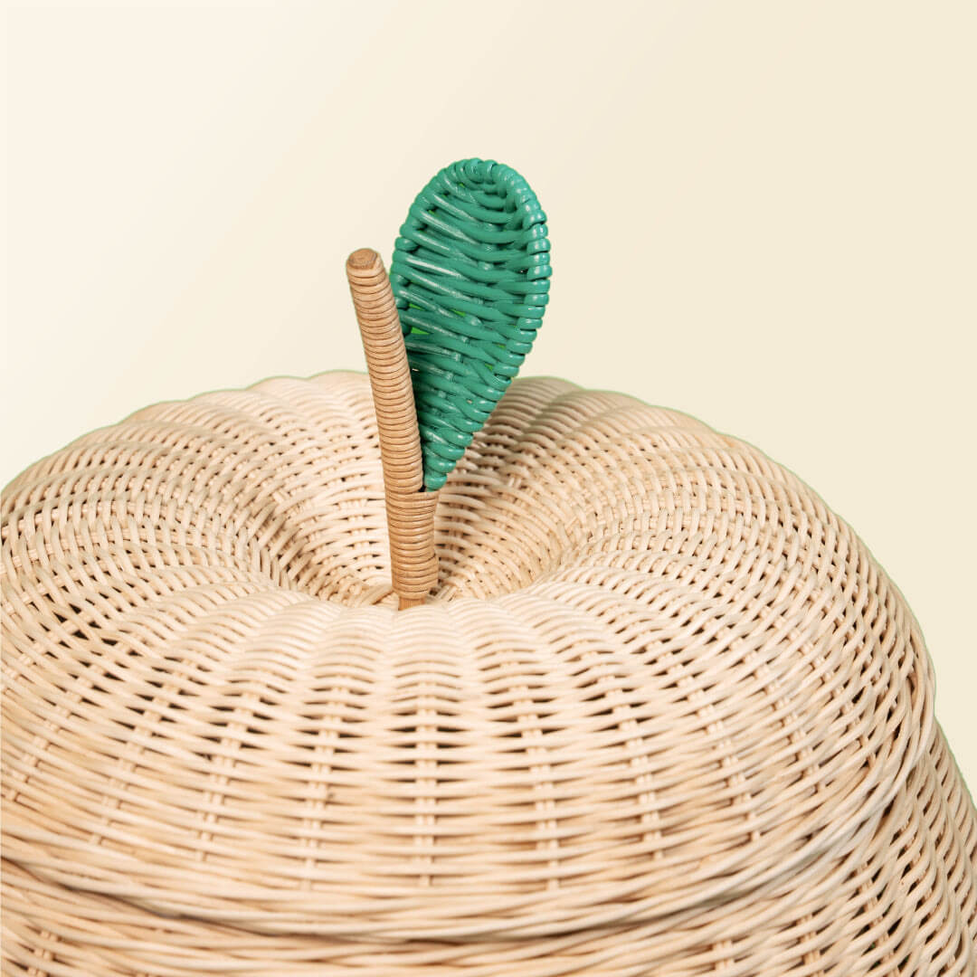 Close up view of the lid of natural apple rattan storage basket by MOMIJI.