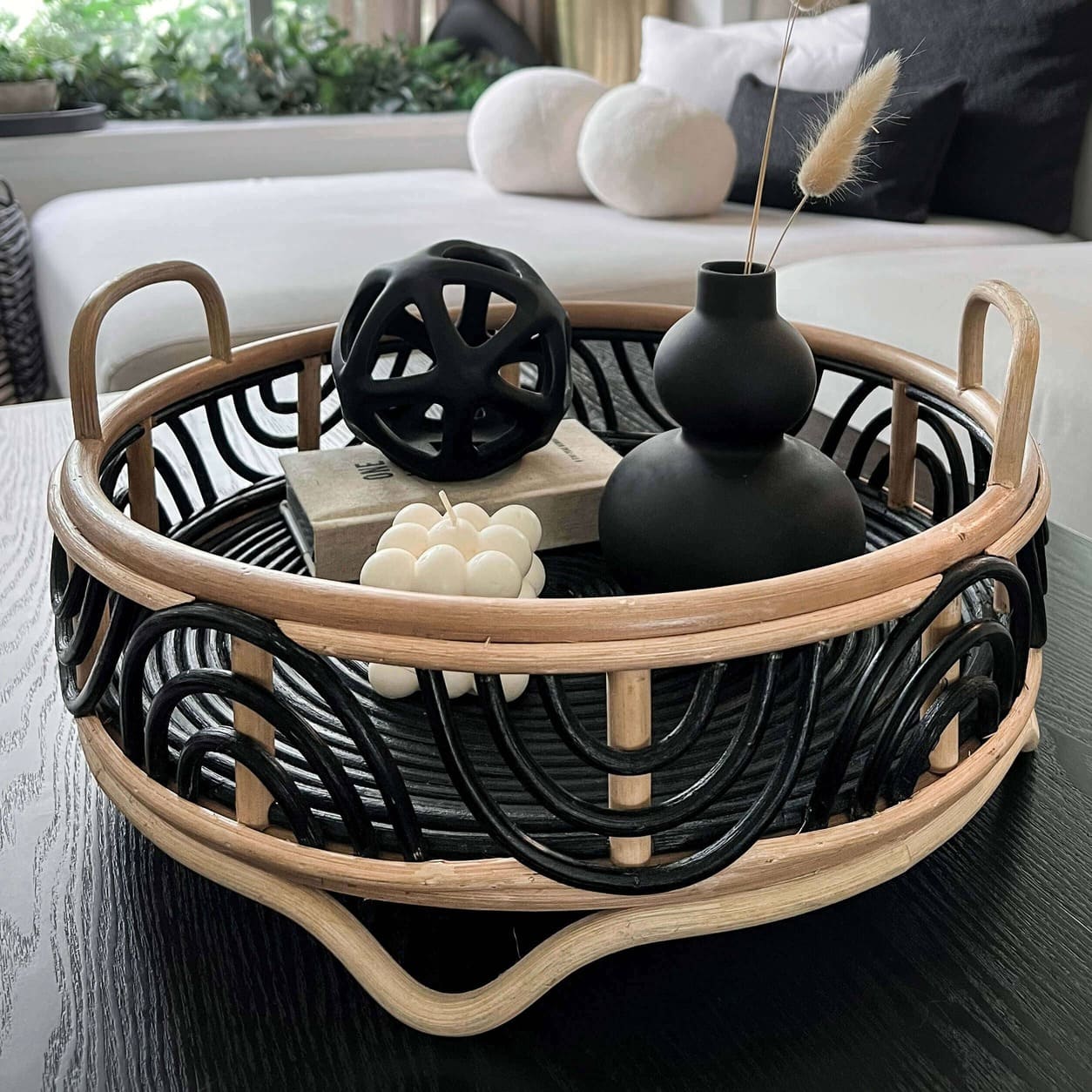 Belle Tray by MOMIJI styled with a black vase and candle on a table.