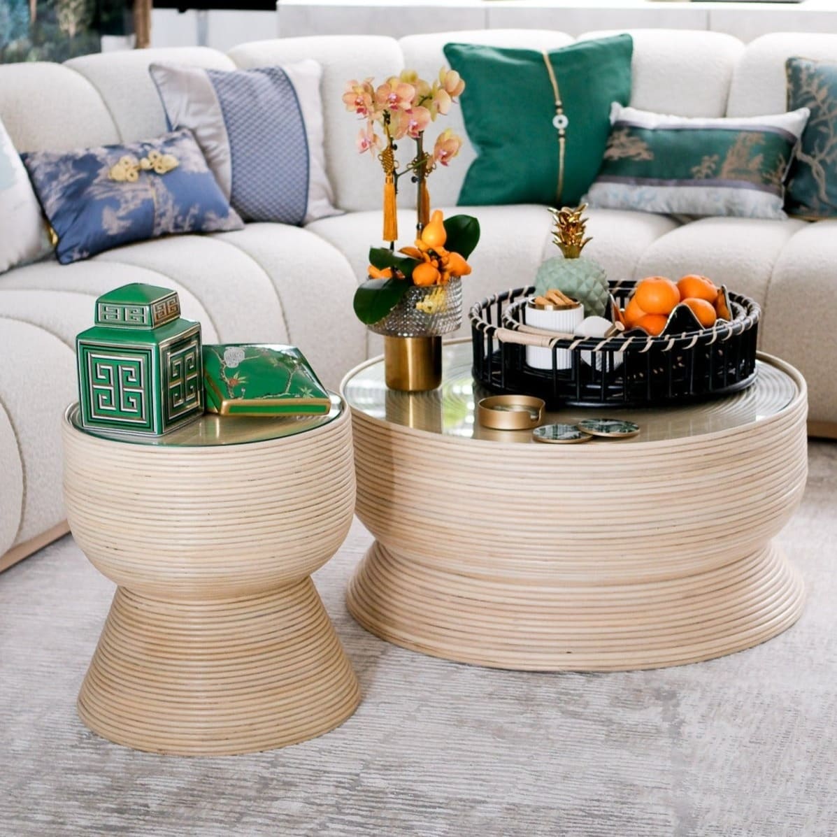 Charme Coffee Table and matching side table by MOMIJI displayed together on a rug for size comparison.