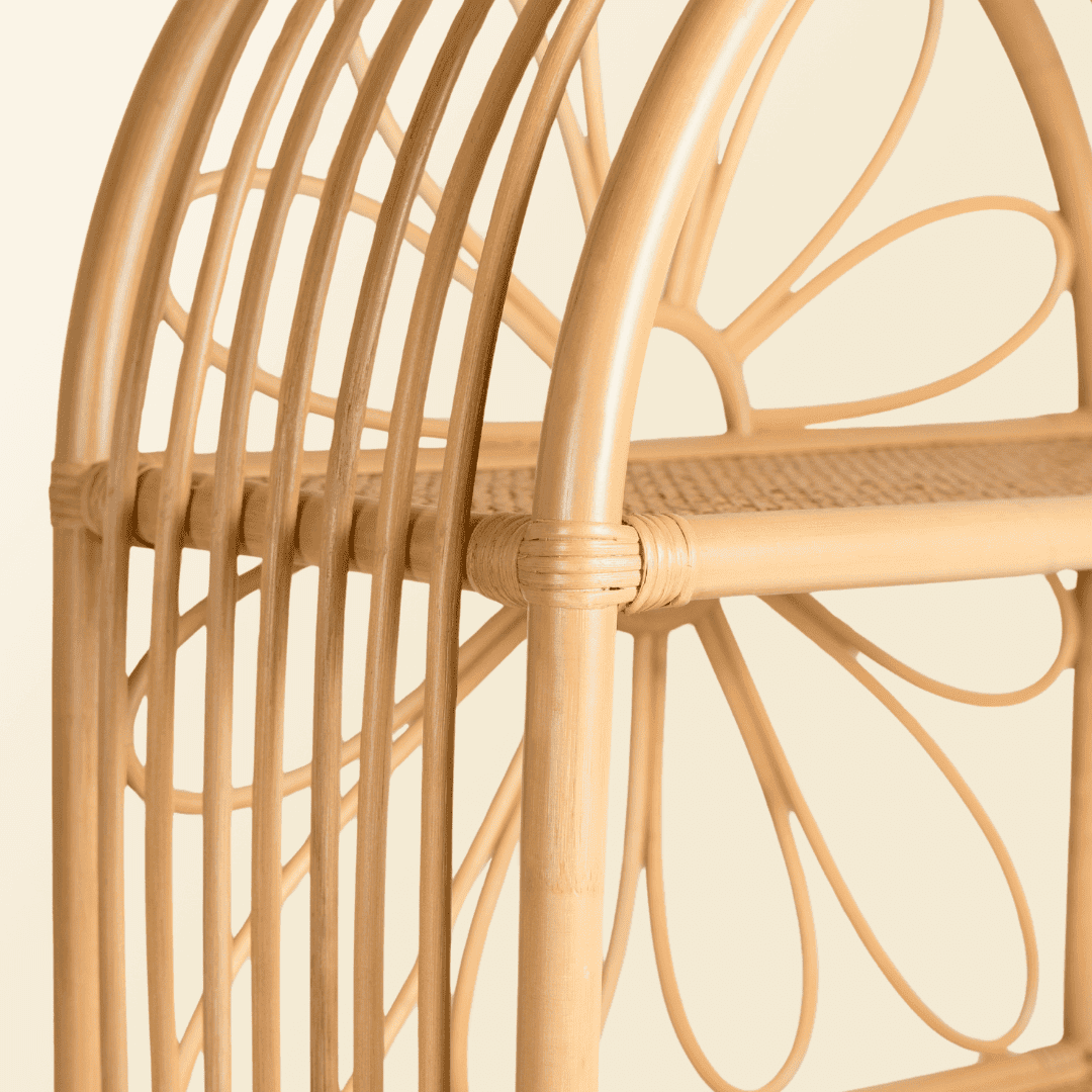 Close-up of the woven rattan craftsmanship on the Daisy Arch Shelf by MOMIJI.