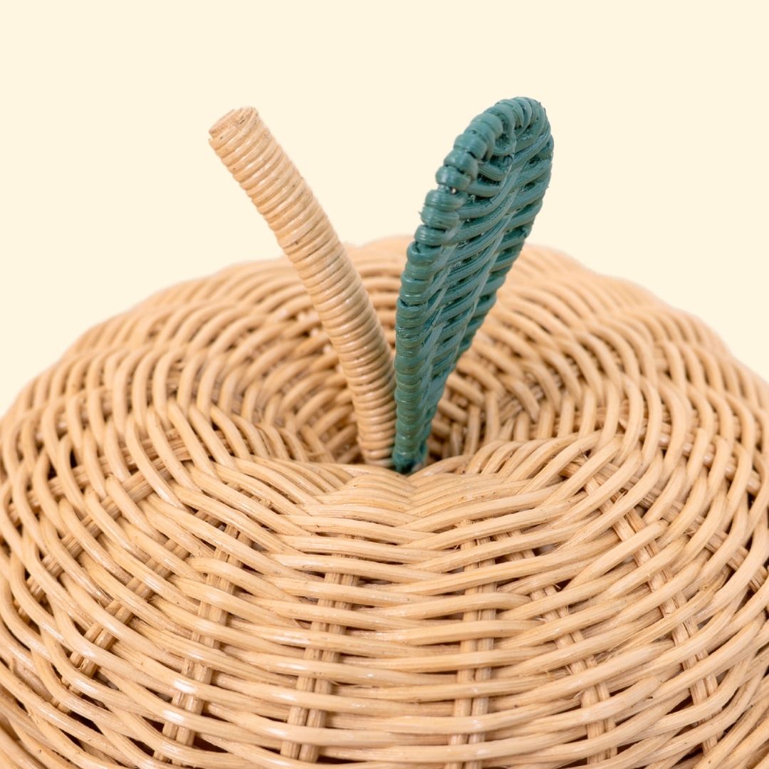 Close-up top view of the Apple Rattan Storage Basket by MOMIJI in natural version, small size, highlighting the lid detail.