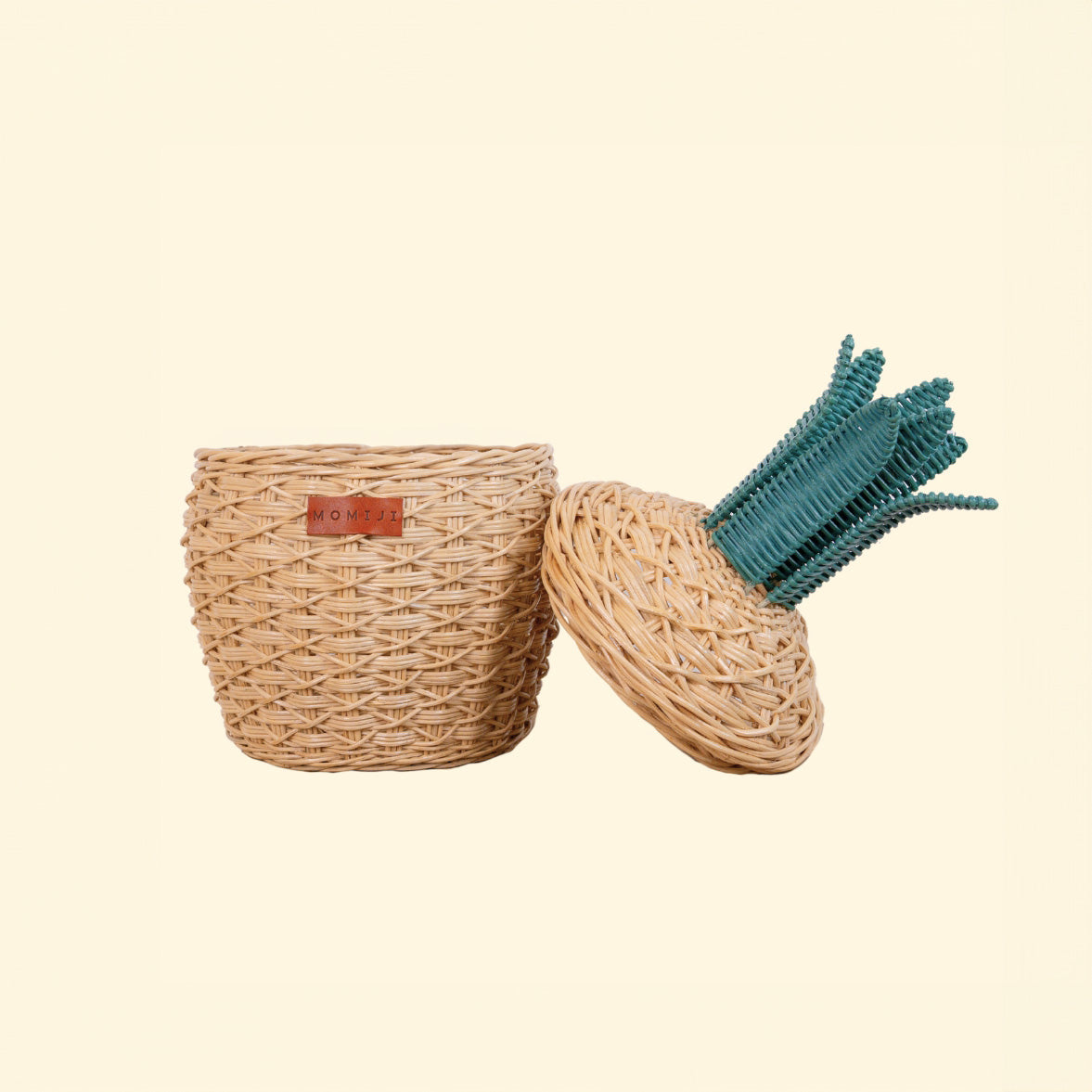 Front view of a handcrafted natural pineapple rattan storage basket in small size by MOMIJI with the lid open, highlighting its compact storage space.