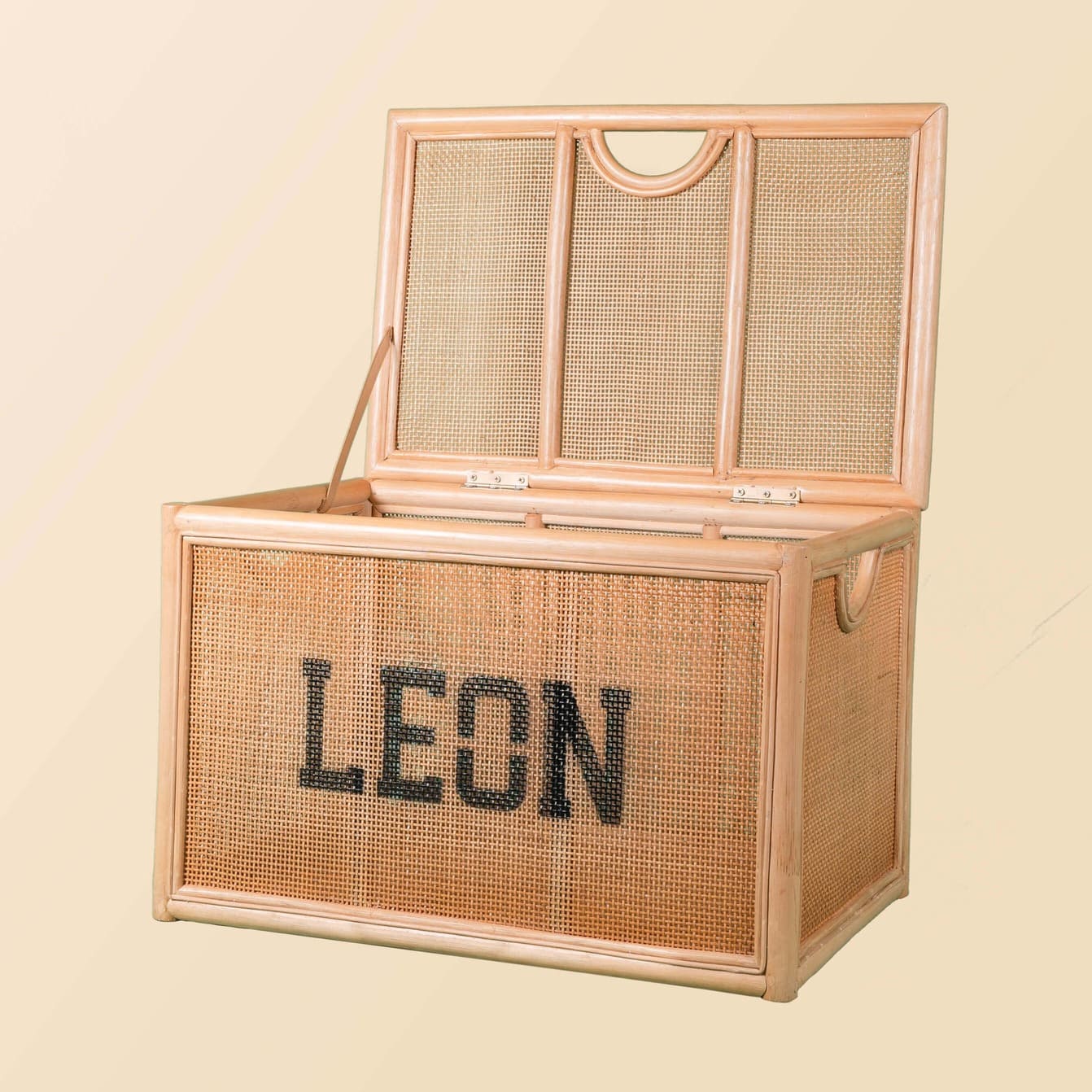 Angled view of the Quentin Trunk by MOMIJI with the lid open.