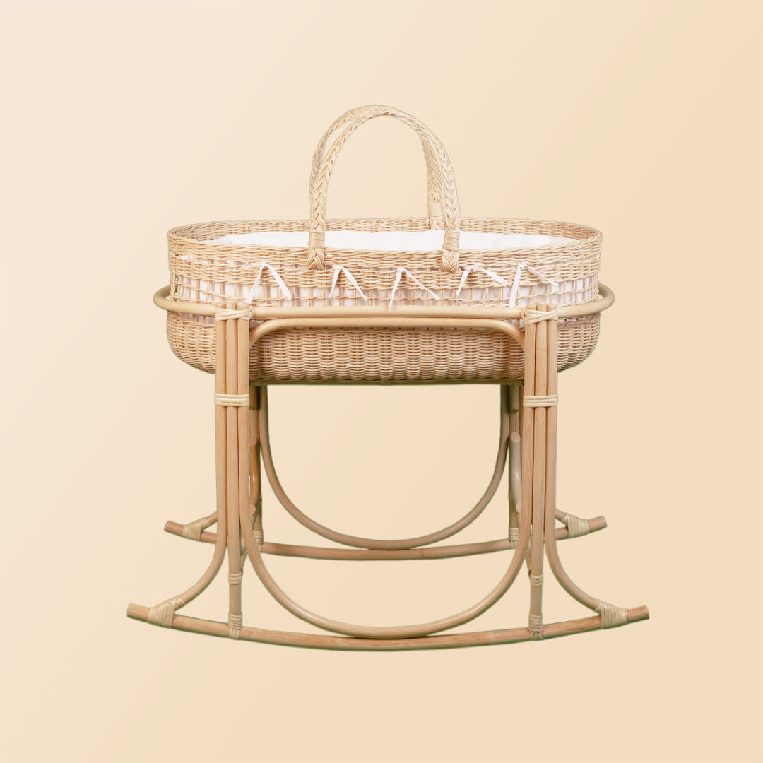 Side view of the rocking stand for the Vera Moses Basket by MOMIJI.