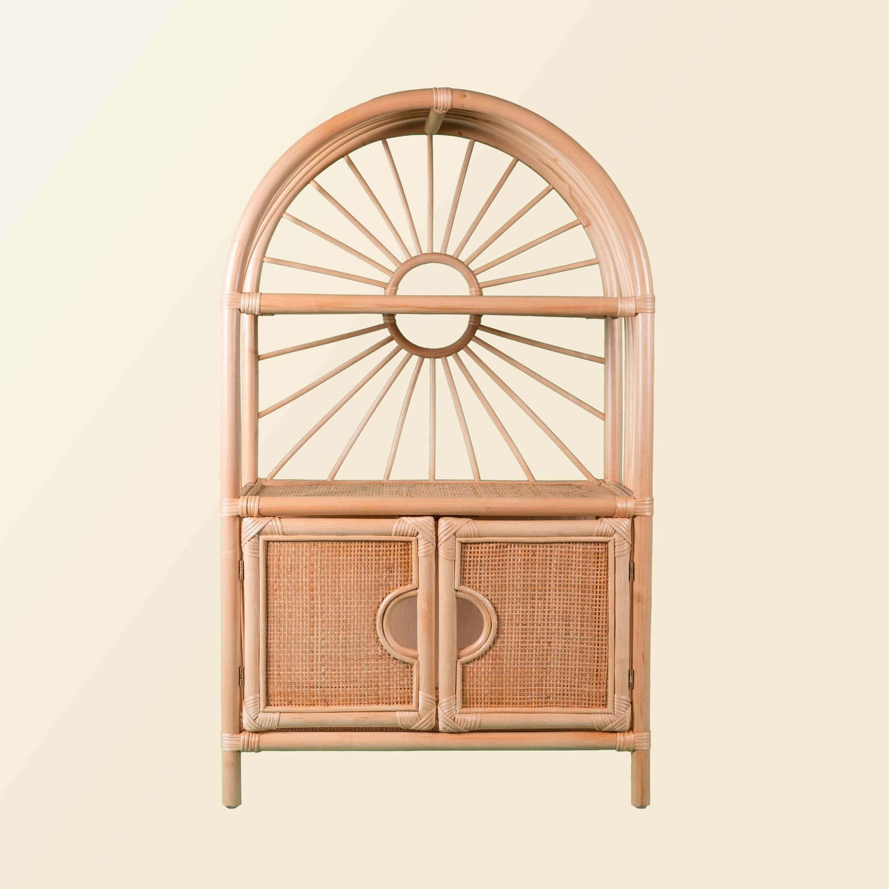 Front view of the handcrafted rattan wicker Sunshine Arch Cabinet Shelf by MOMIJI, showing its arched design and cabinet structure.