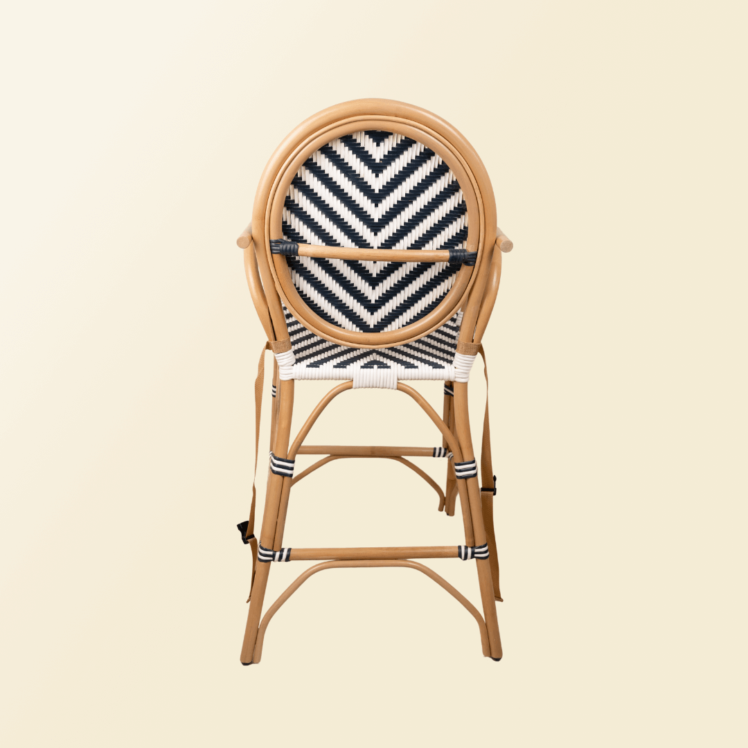 Back view of the handcratfedrattan wicker Tumbuh Kids High Chair by MOMIJI.