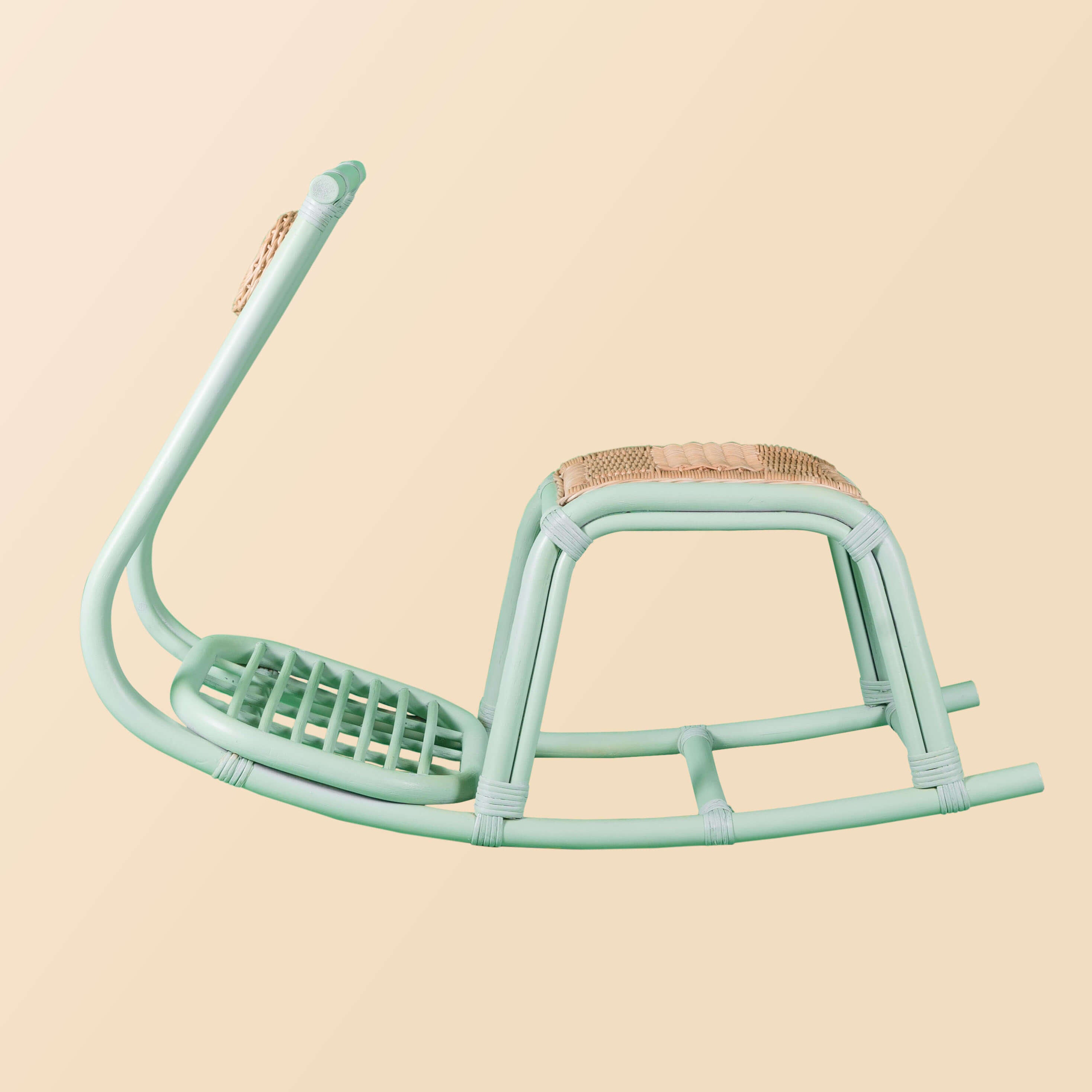 Side view of the Vespa Rocker – Mint by MOMIJI.