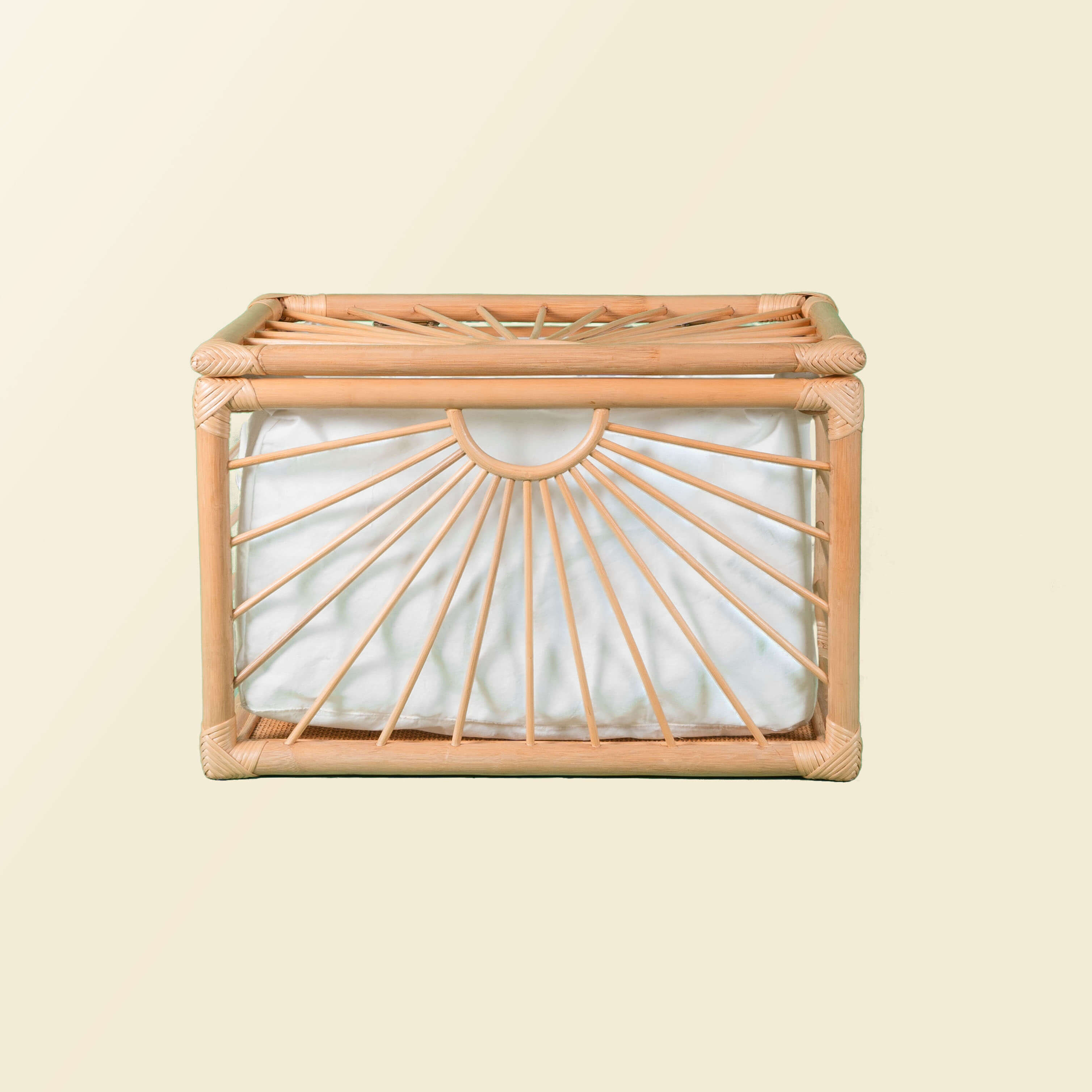 Front view of the wicker Xander Trunk by MOMIJI showing its rectangular shape.