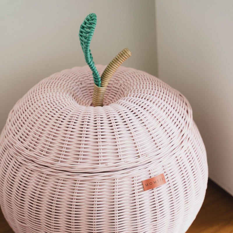 Top view of the pink apple rattan storage basket by MOMIJI.