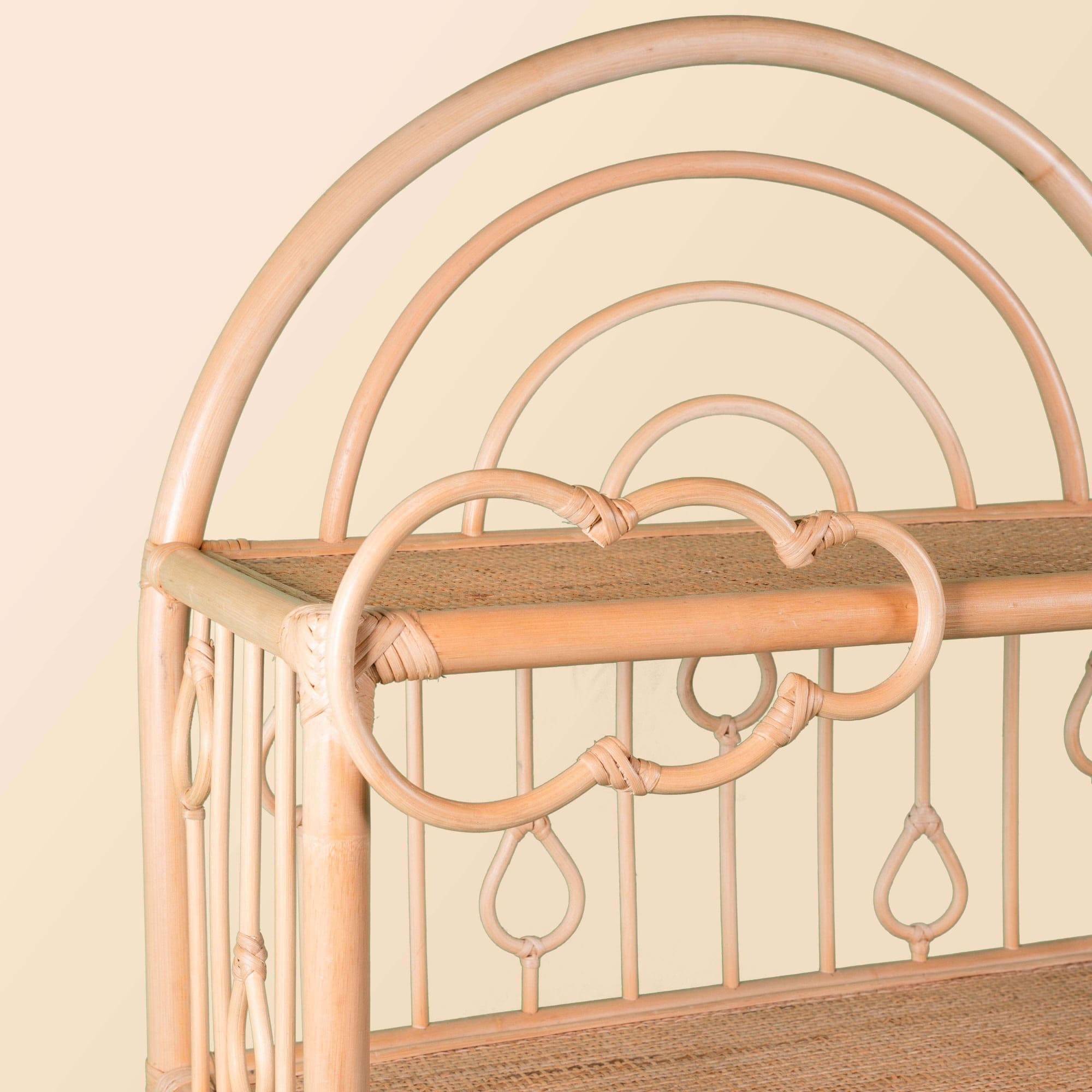 Close-up of the rainbow and cloud motif detail on the top of the After the Rain Shelf by MOMIJI.