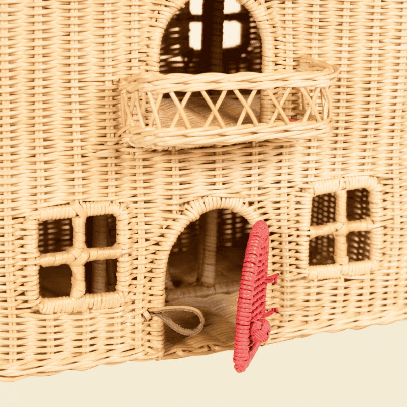 Close-up of the front details of the Amy Dollhouse Tote by MOMIJI, featuring the door, windows, and terrace area.