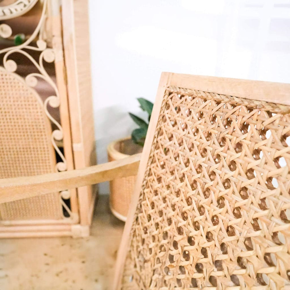 Close-up of the rattan weaving detail on the backrest of the Anya Rocking Chair by MOMIJI.