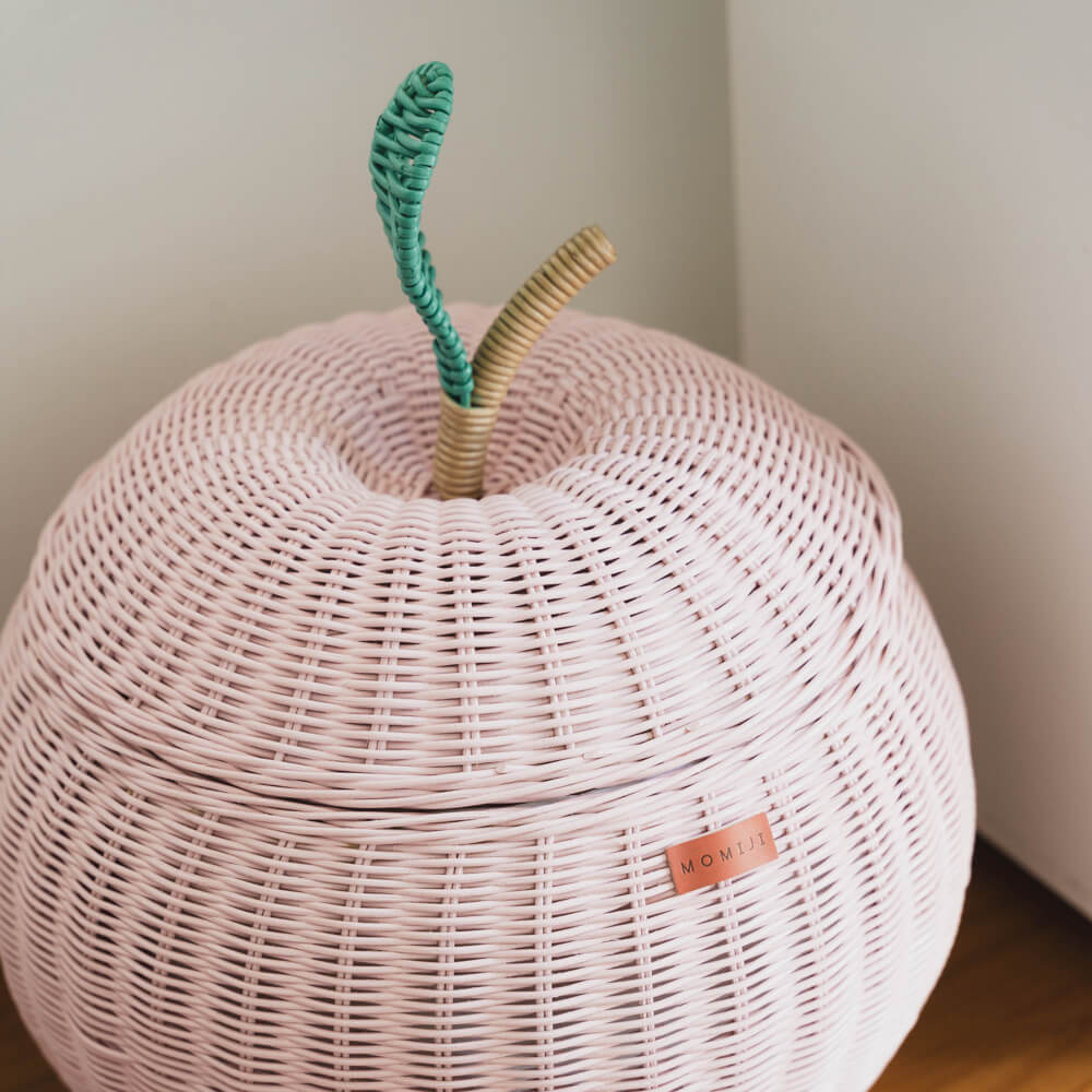 Top view of the pink apple rattan storage basket by MOMIJI.