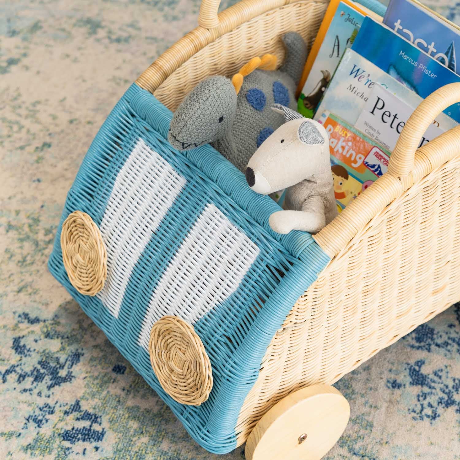 Archie Storage Wagon by MOMIJI used to store children’s books and toys.