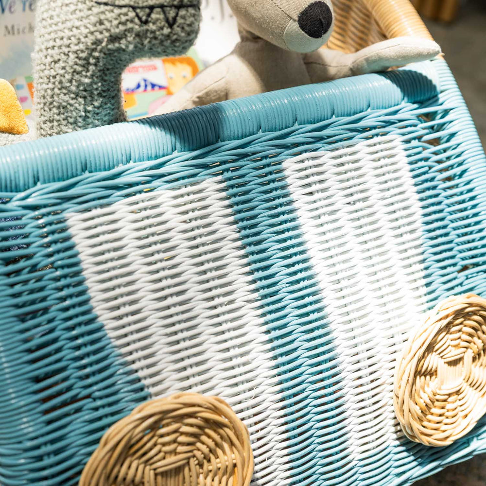 Close-up of the front area of the Archie Storage Wagon by MOMIJI filled with toys.