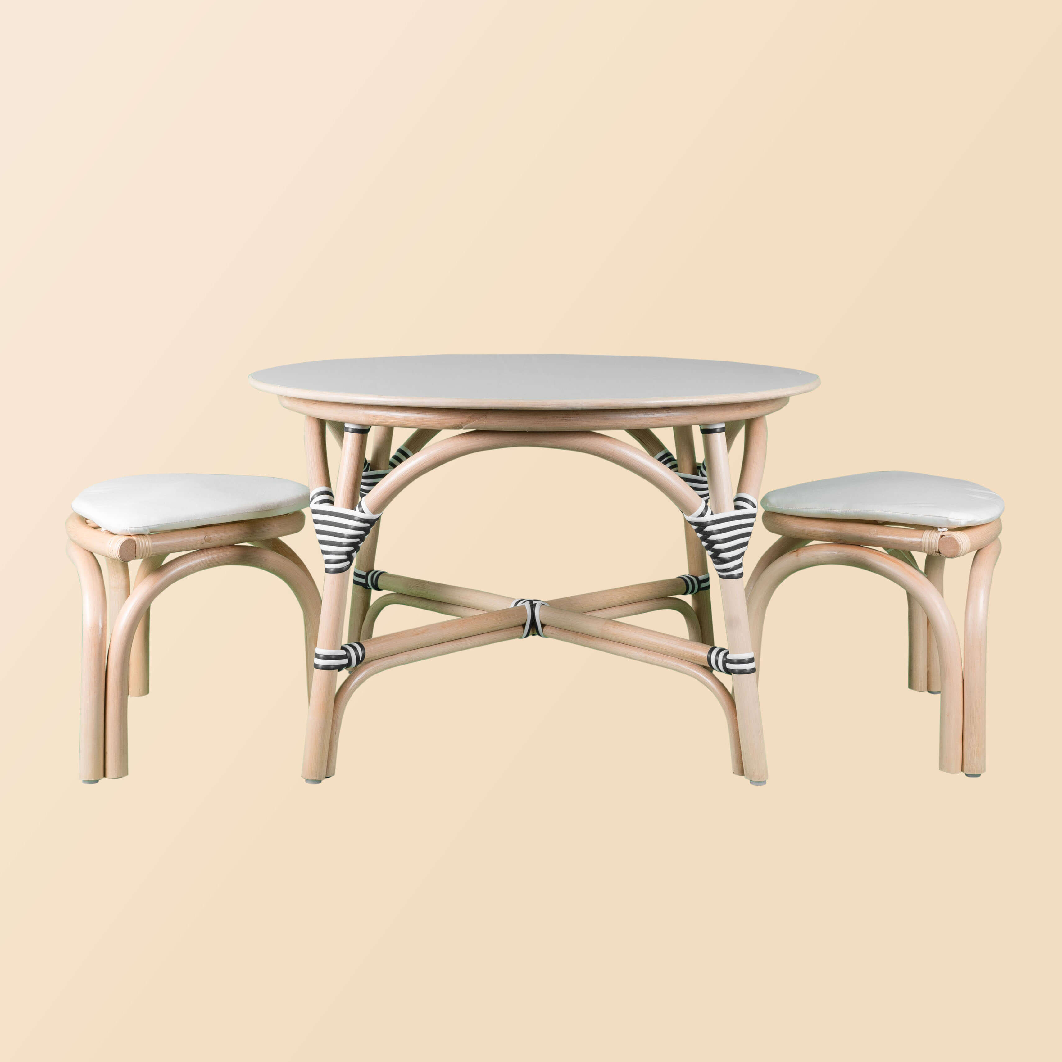 View of the Aulia Kids Table by MOMIJI with stools pulled out and ready for use.