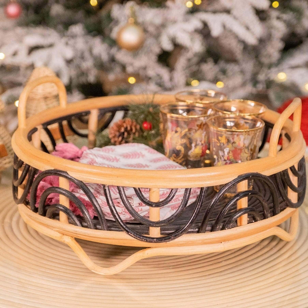 Belle Tray by MOMIJI styled with decorative items on a table in front of a Christmas tree.