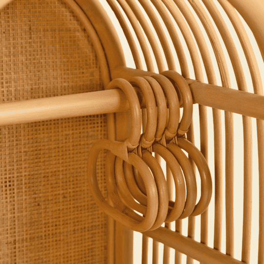 Close-up of the hook area inside the Blossom Doll Closet by MOMIJI with hanging doll clothes.