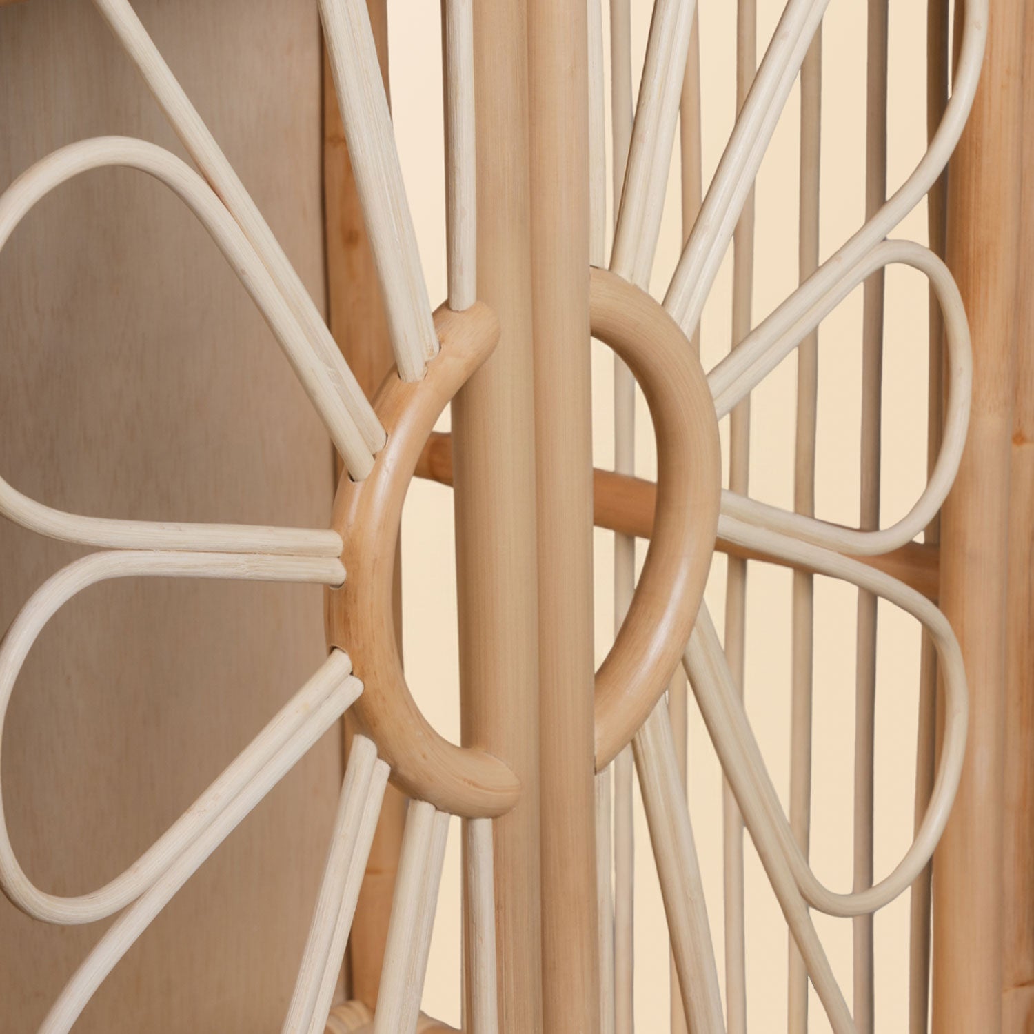 Close-up of rattan flower integrated door handle detail on kids wardrobe cabinet rack