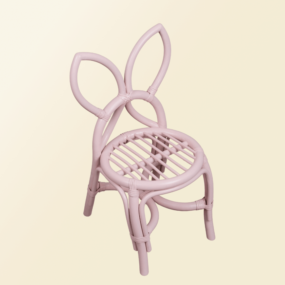 Tilted side of pink Butterfly Kids Chair by MOMIJI.