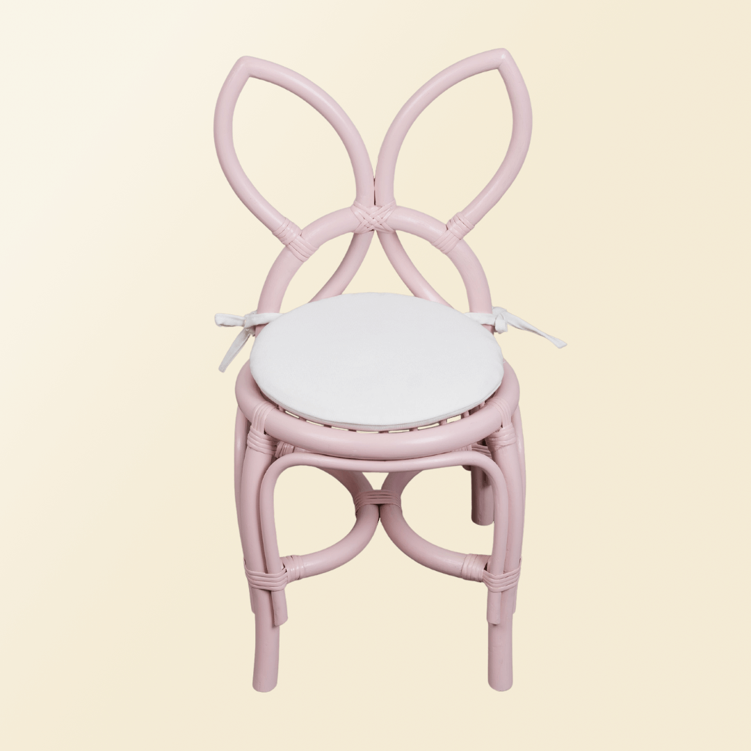 Front View of pink Butterfly Kids Chair with white cushion by MOMIJI.