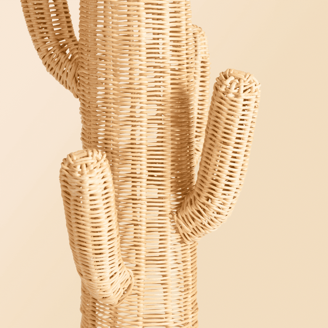 Close-up of the rattan arm detail of the Cactus Kids Coat Light Stand by MOMIJI, designed as a functional hook for hanging bags and clothes.