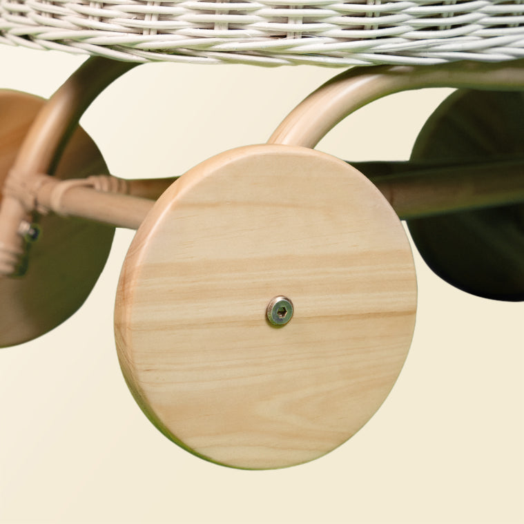 Close-up of the wooden wheel detail on the Colette Doll Stroller by MOMIJI.