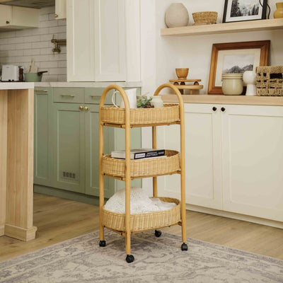 Handcrafted wicker rattan Con Craft Trolley by MOMIJI with three tier basket trays styled in a kitchen with cabinets and home decor