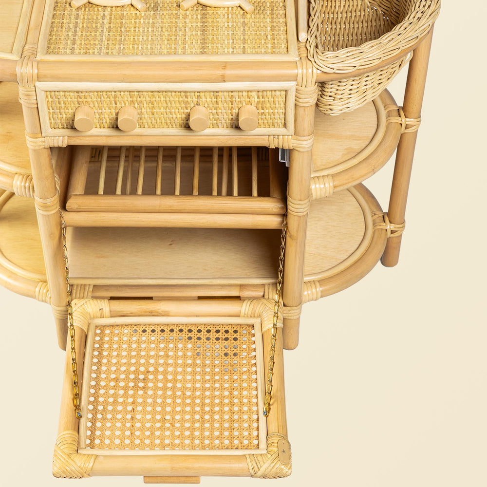 Close-up of the oven area of the Dreamer Play Kitchen by MOMIJI with the door opened downward.