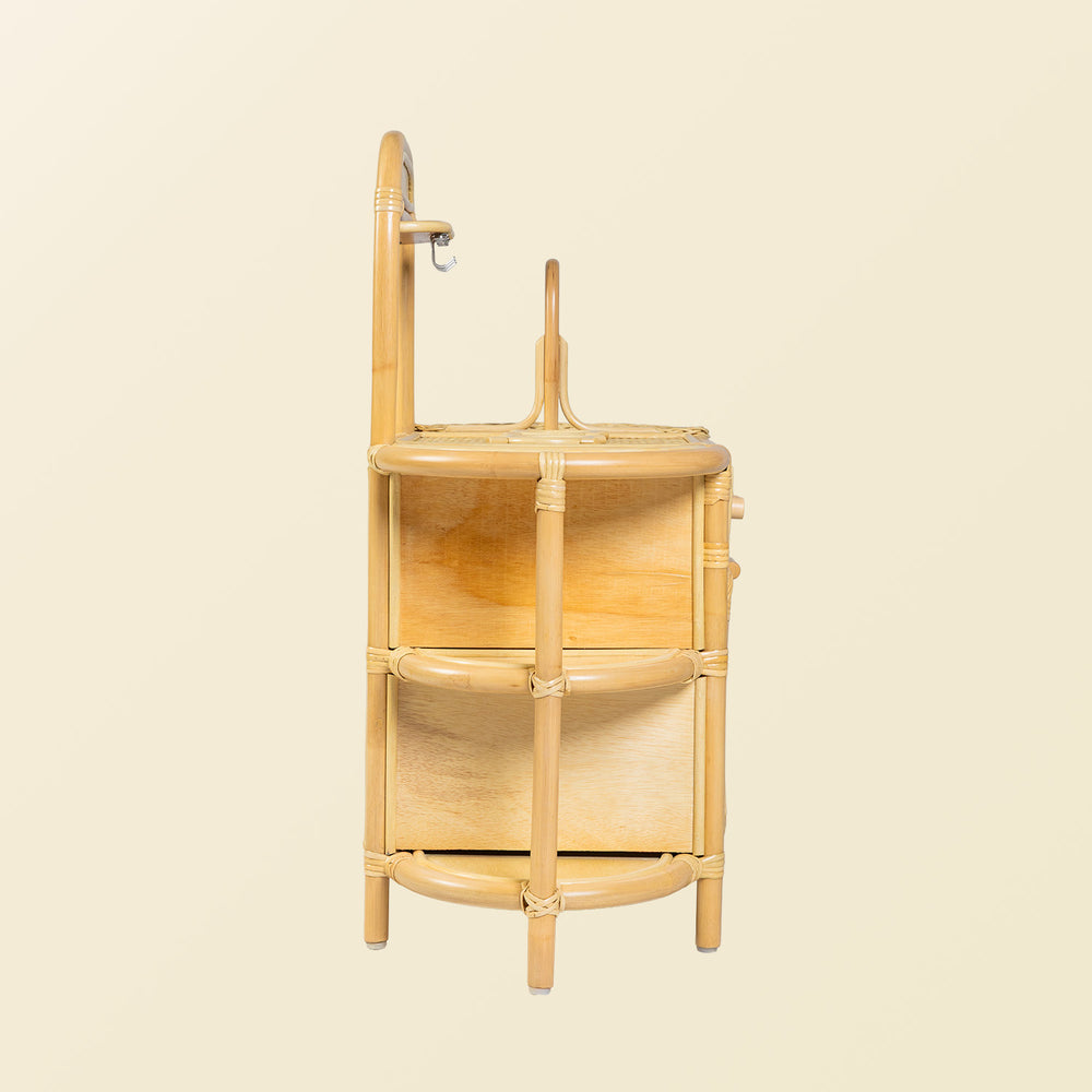 Side view of the Dreamer Play Kitchen by MOMIJI highlighting the storage area.