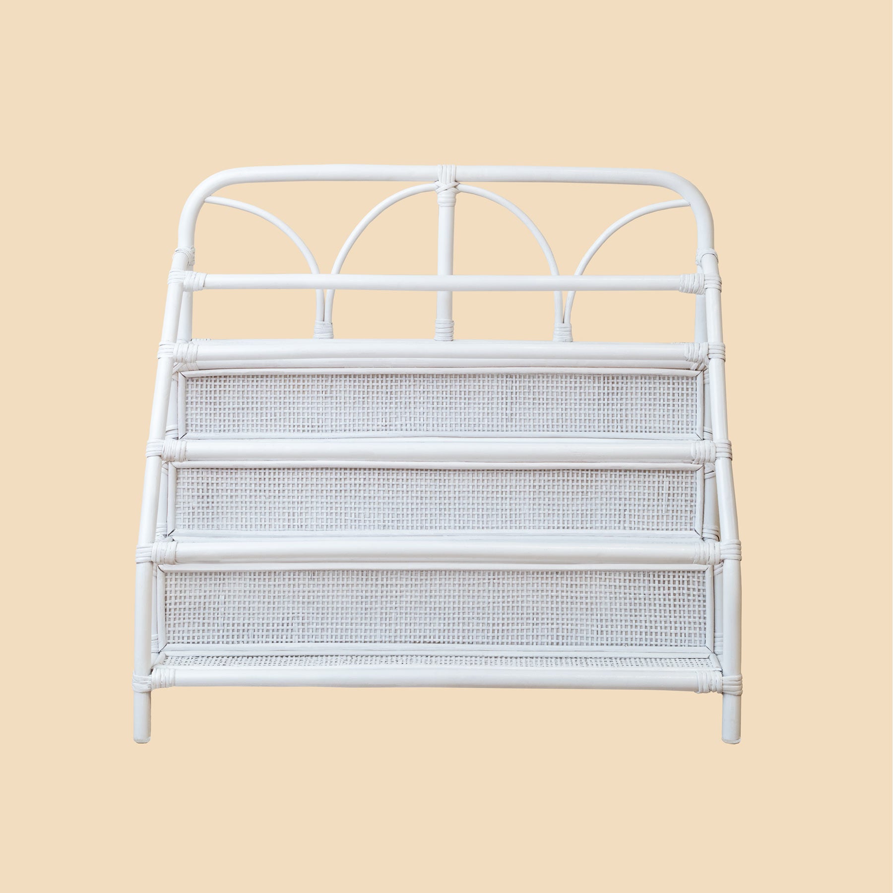 Front view of the handwoven rattan wicker Elena Kids Montessori Bookshelf – White by MOMIJI.