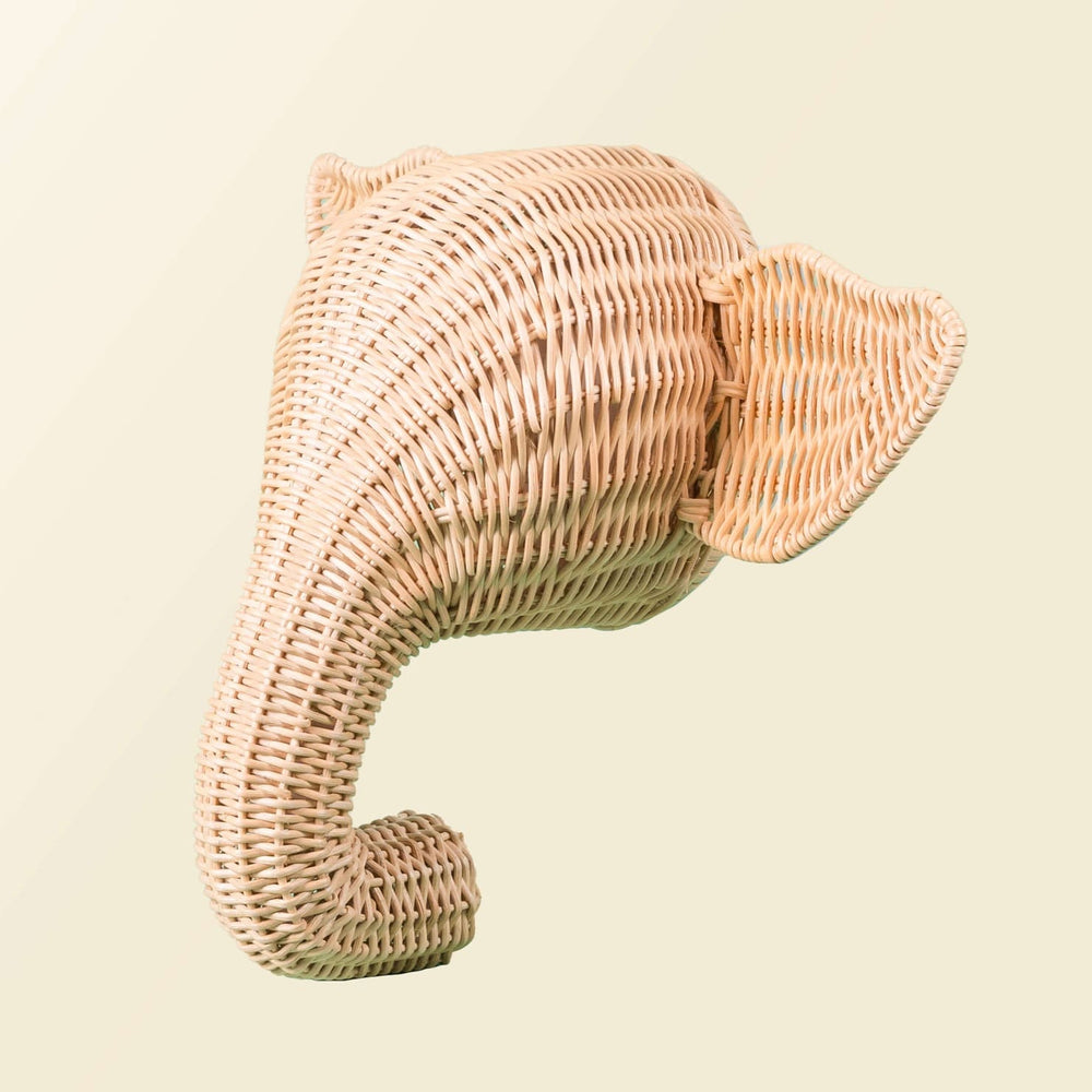 Angled view of the Elephant Wall Decor by MOMIJI highlighting its sculpted shape.