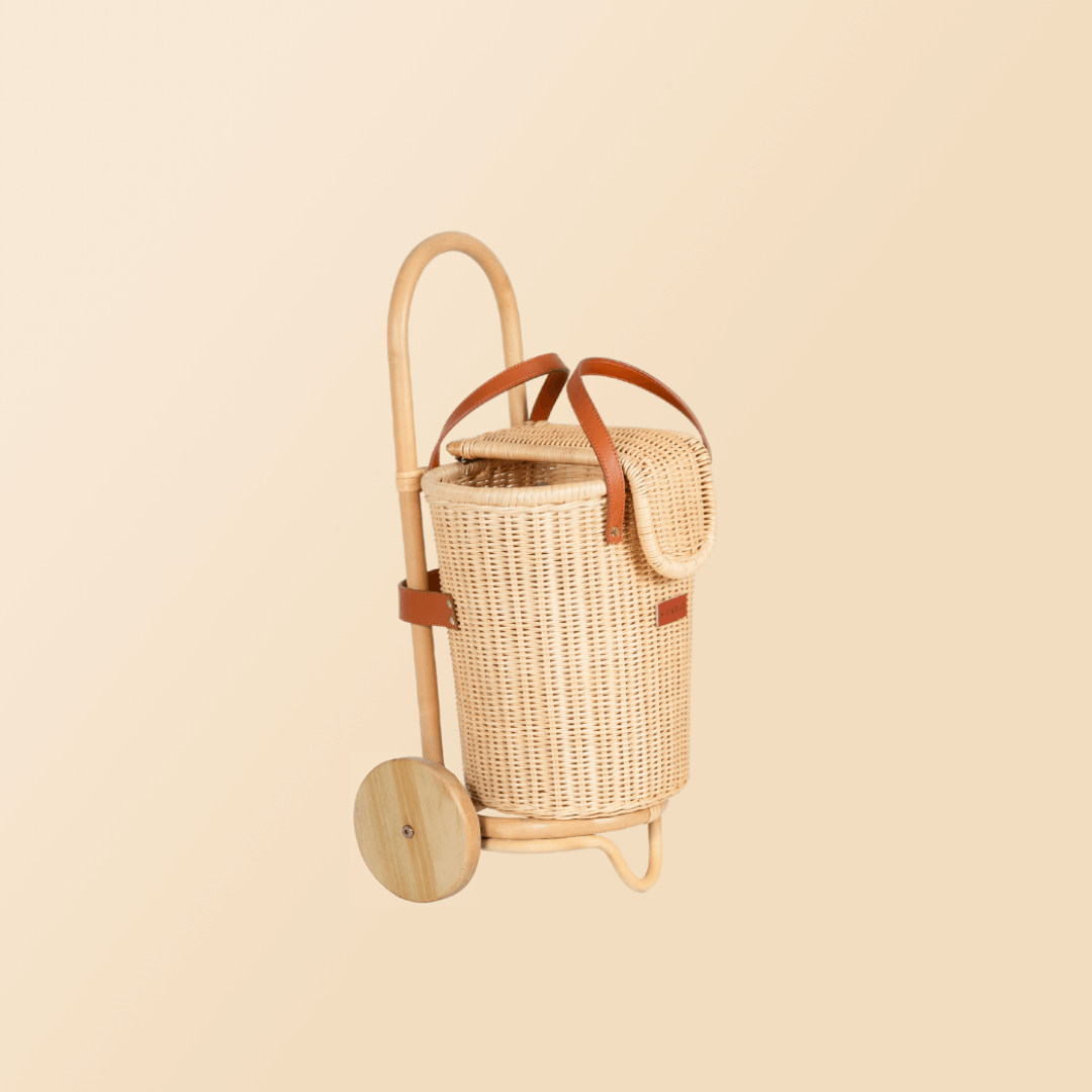 Side view of the Eric Kids Shopping Trolley by MOMIJI, highlighting its compact and playful design.