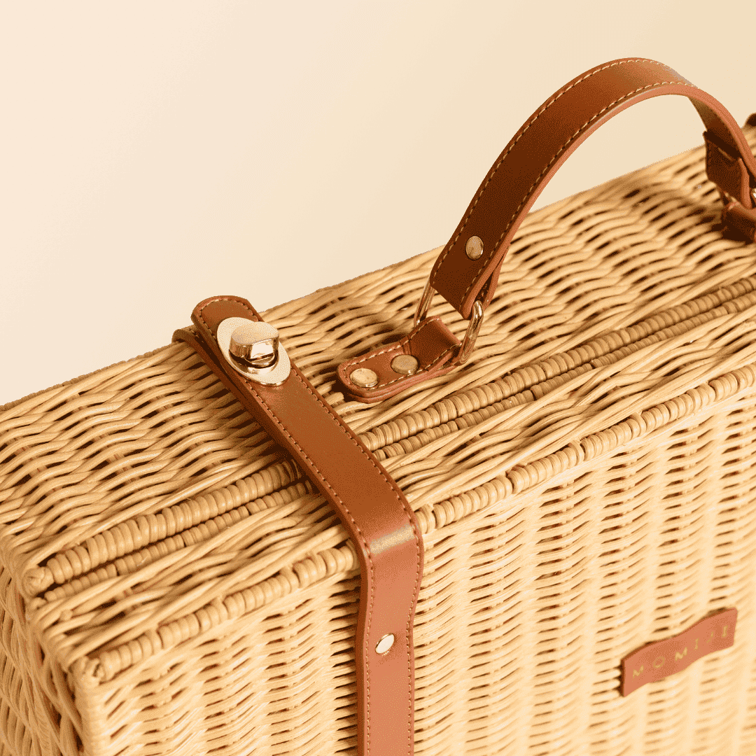 Close-up of the lock mechanism of the Natural version of Jasmine rattan Suitcase by MOMIJI.