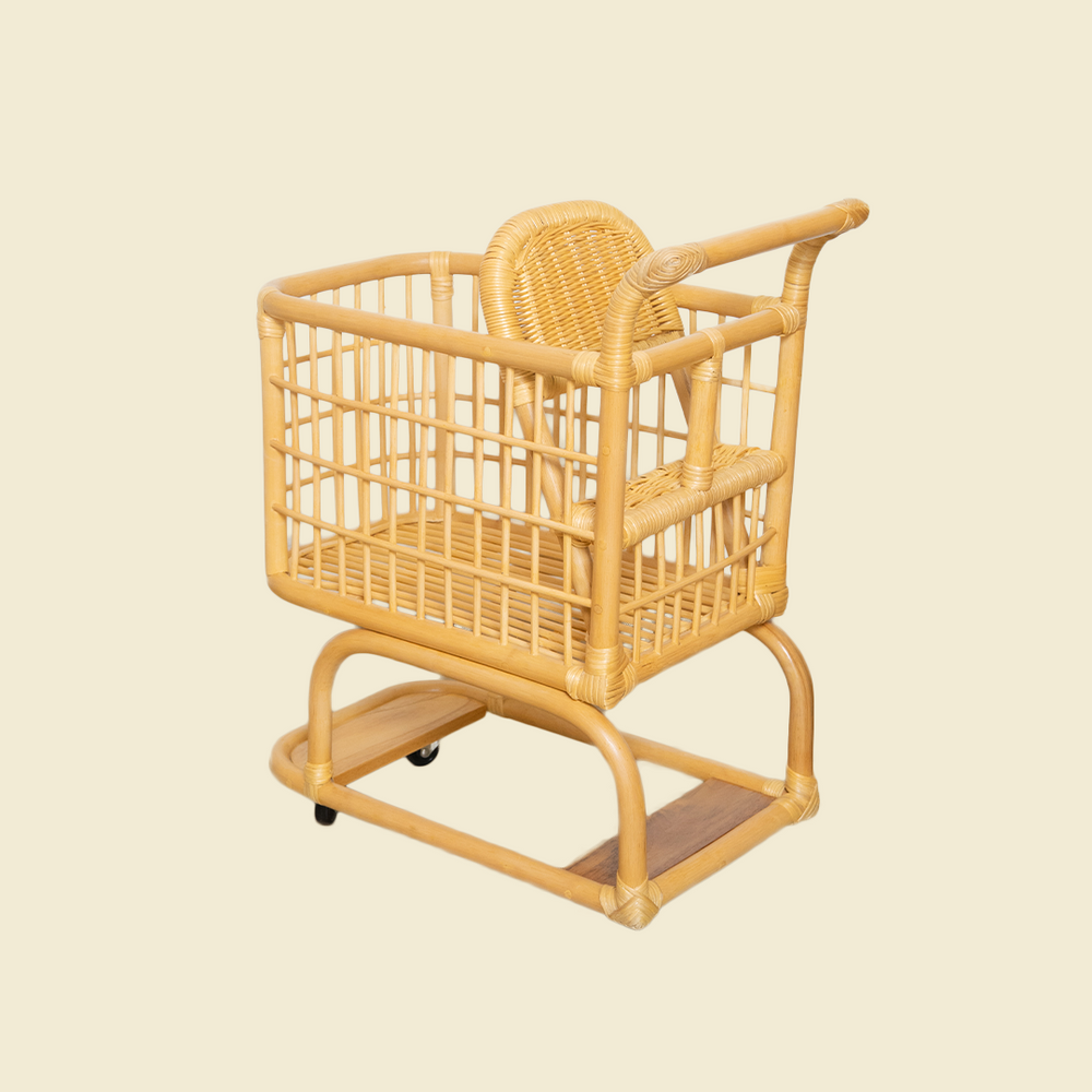 Back view of the handcrafted wicker rattan Kids Shopping Cart by MOMIJI, featuring its supportive handle and stable structure
