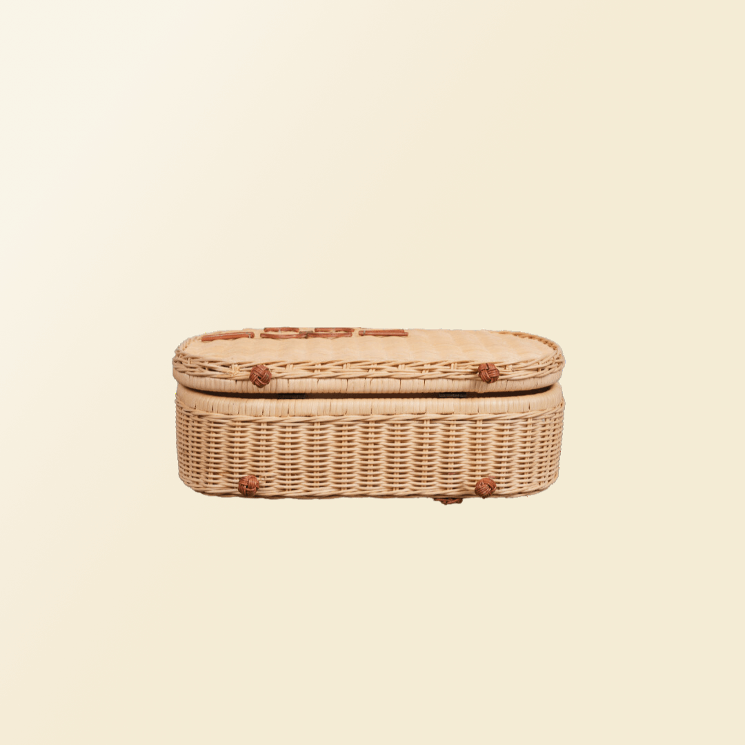 Bottom view of the handcrafted rattan Kitty Kids Suitcase by MOMIJI.