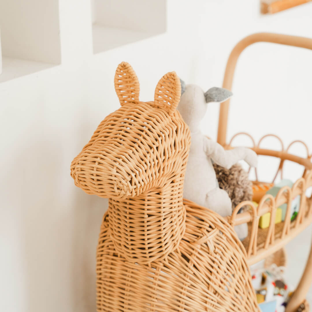 Front view of the Llama Craft Trolley by MOMIJI filled with toys, styled in a bright kids room.