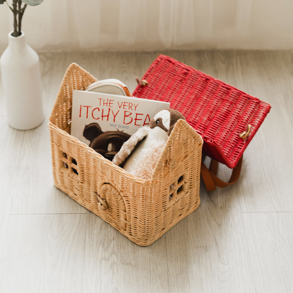 Lydia House Bag by MOMIJI opened to reveal children’s books and toys stored inside.