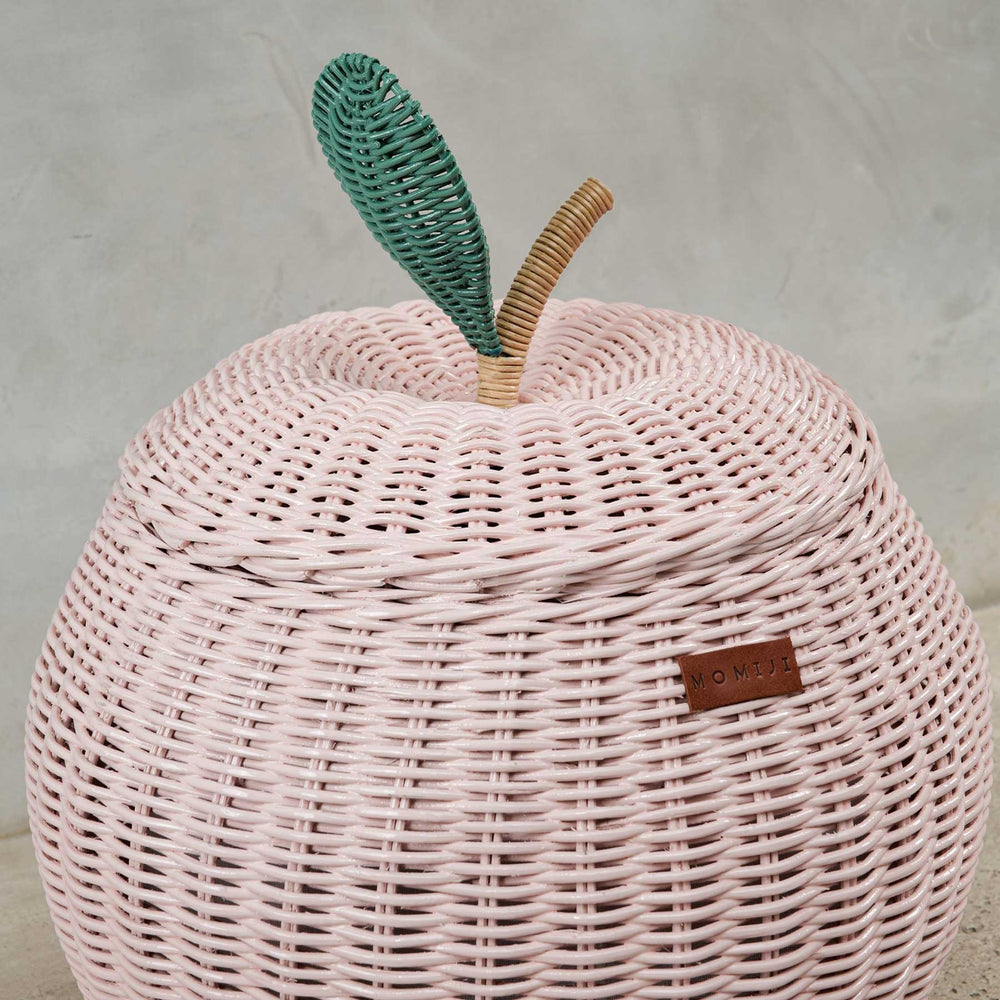Close up view of pink apple rattan storage basket lid by MOMIJI in medium size.