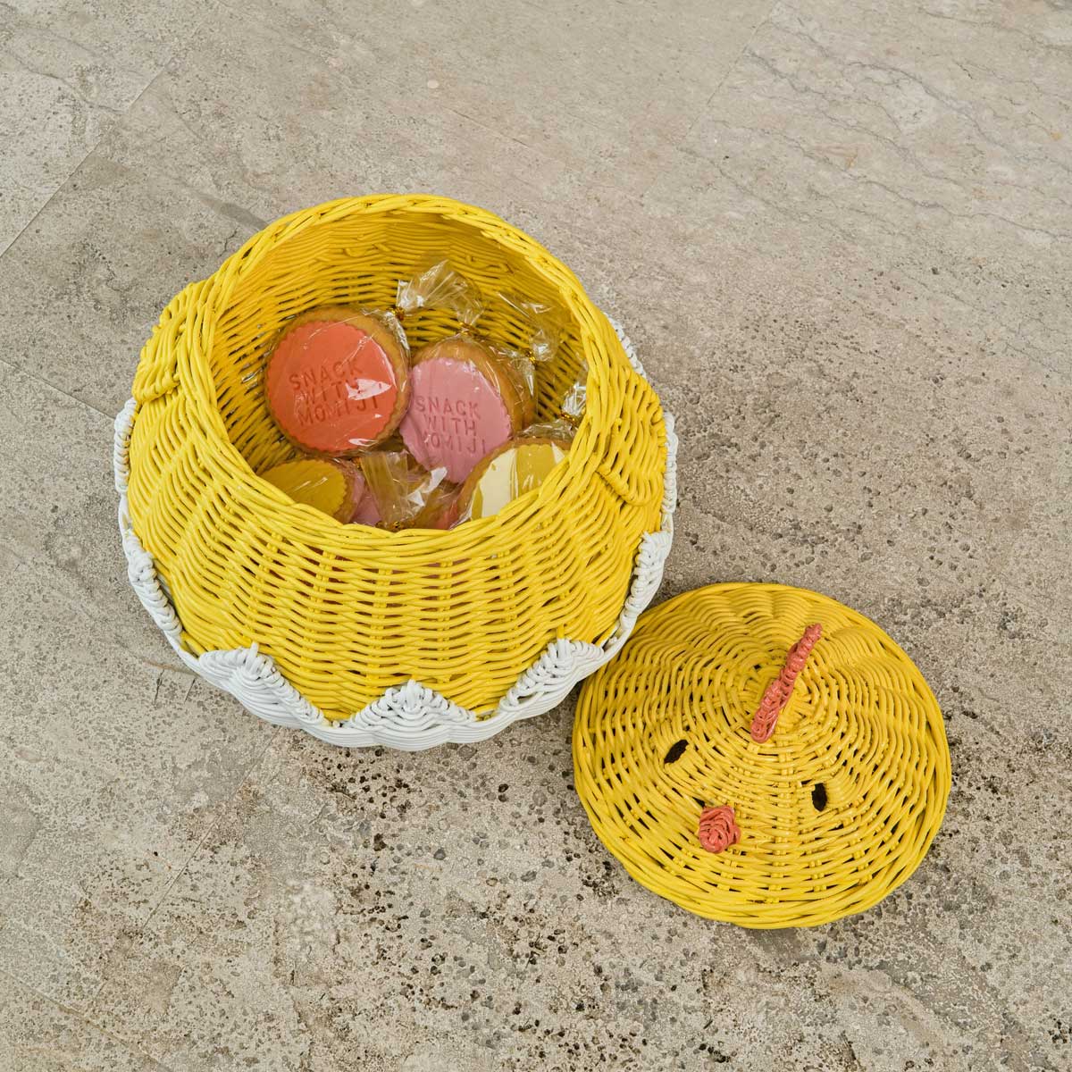 Chick Rattan Storage Basket by MOMIJI with Snacks inside.