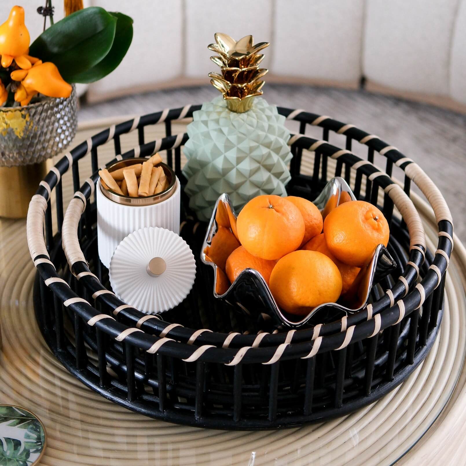 Front angled view of the Maru Tray Set by MOMIJI styled with fruit bowls and decorative items.