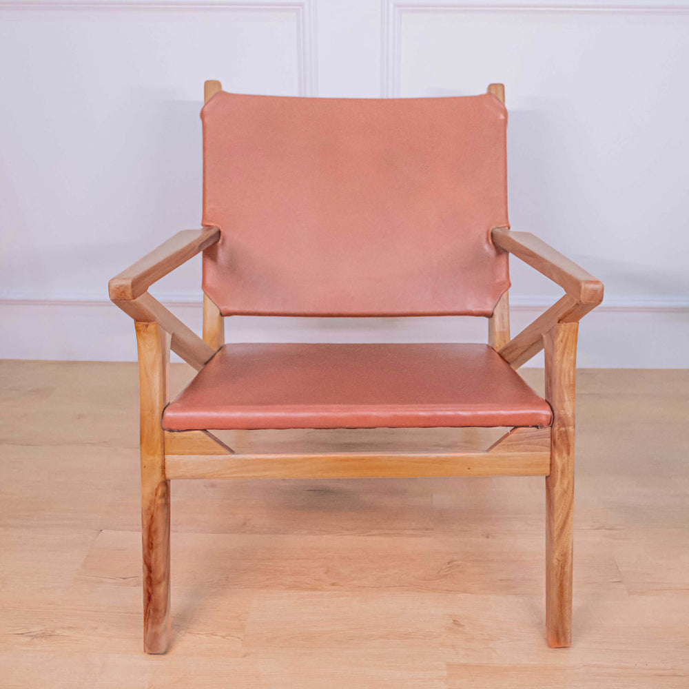 Front view of the Monty Leather Lounge Chair by MOMIJI in a styled room.