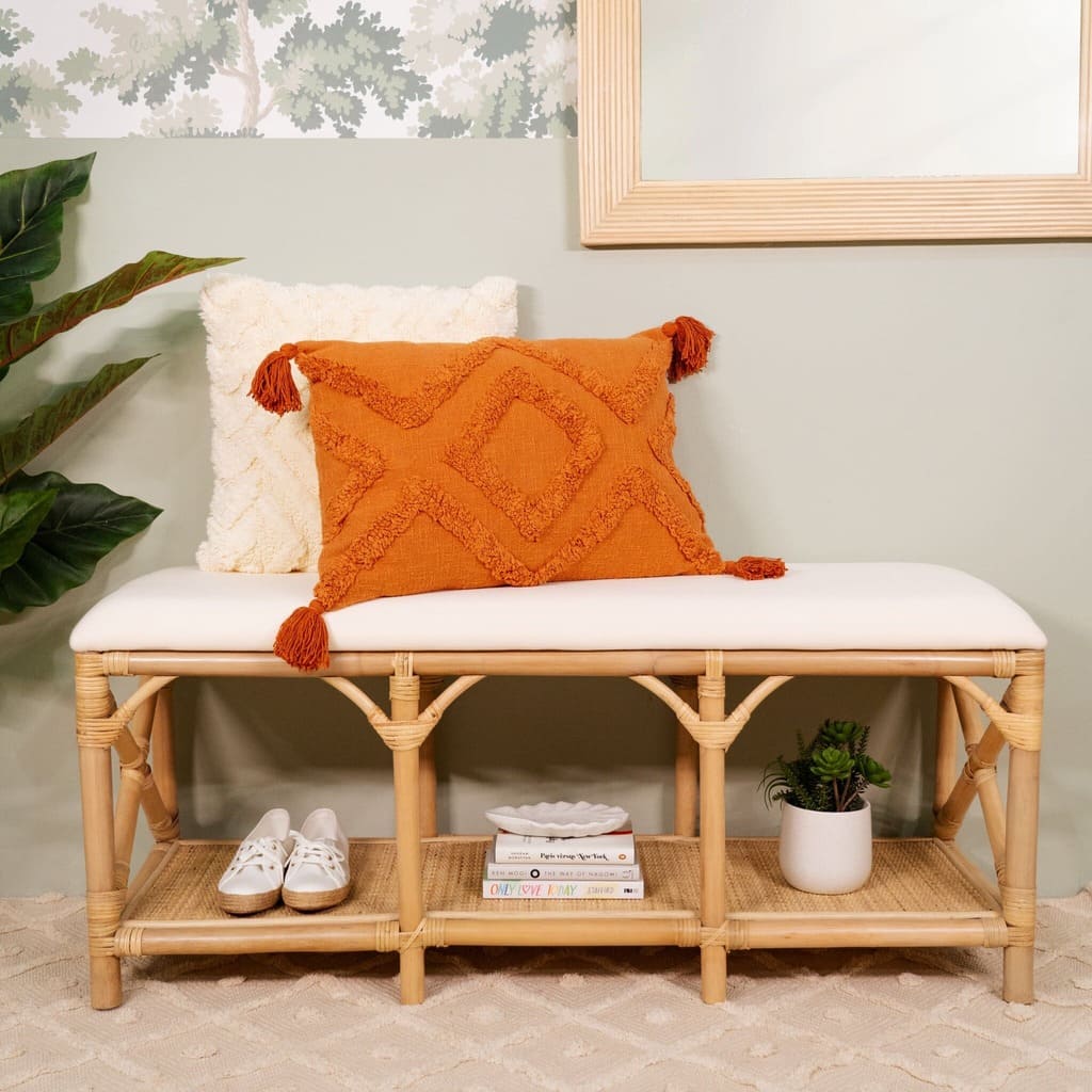 Front view of the Palma Bench by MOMIJI styled with a cushion and shoes stored below.