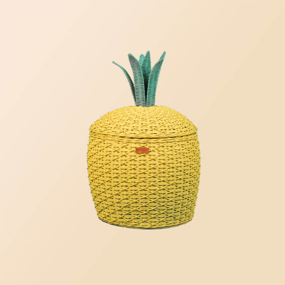 Front view of the yellow Pineapple Rattan Storage Basket in large size.