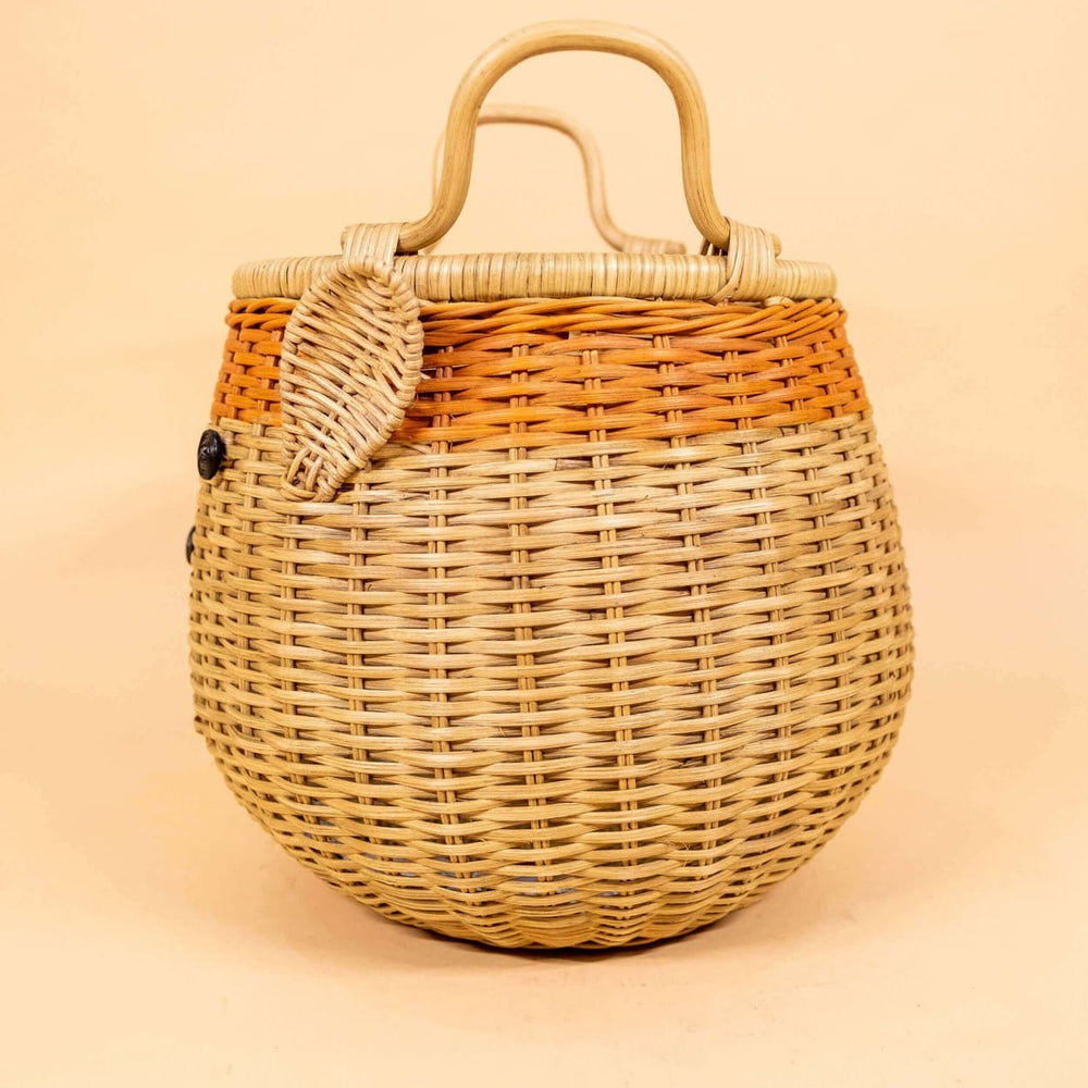 Side view of Reindeer Rattan Storage Basket.