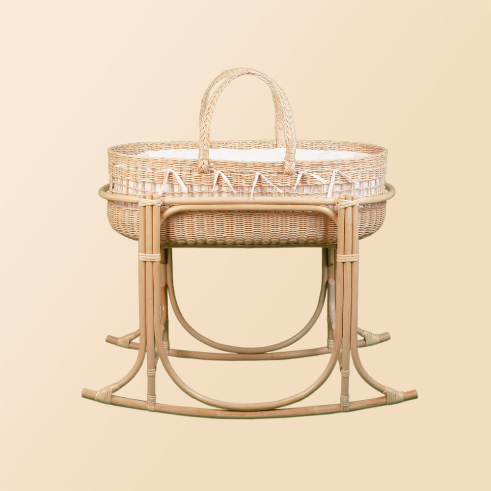 Side view of the rocking stand for the Vera Moses Basket by MOMIJI.