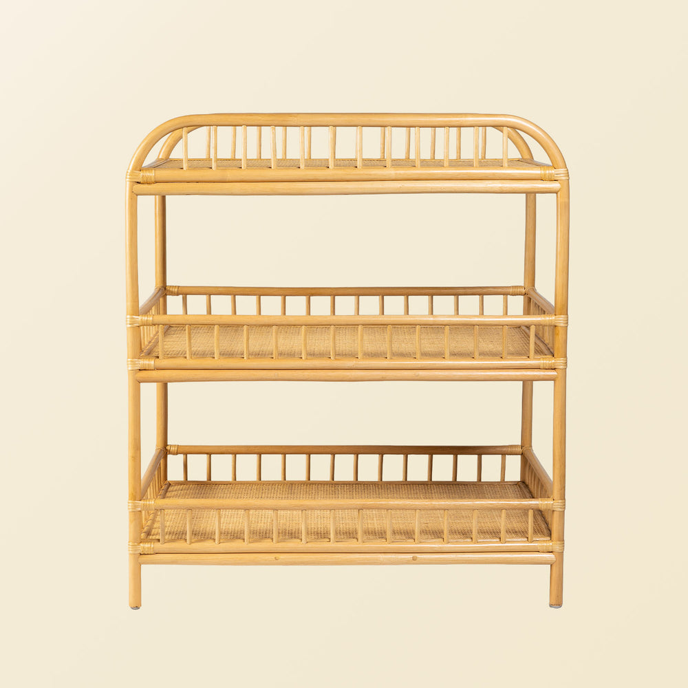 Handcrafted Lestari changing table and shelves by MOMIJI with a full rattan frame in beige natural rattan, shown without styling on a neutral background.