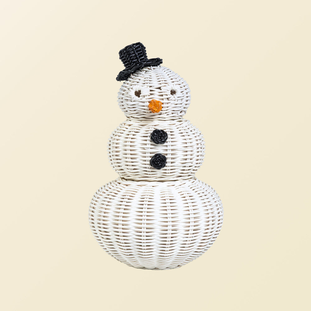 Handcrafted rattan wicker snowman basket by MOMIJI with a white color, featuring round eyes, carrot nose detail, black top hat, and round button accents on a beige background.